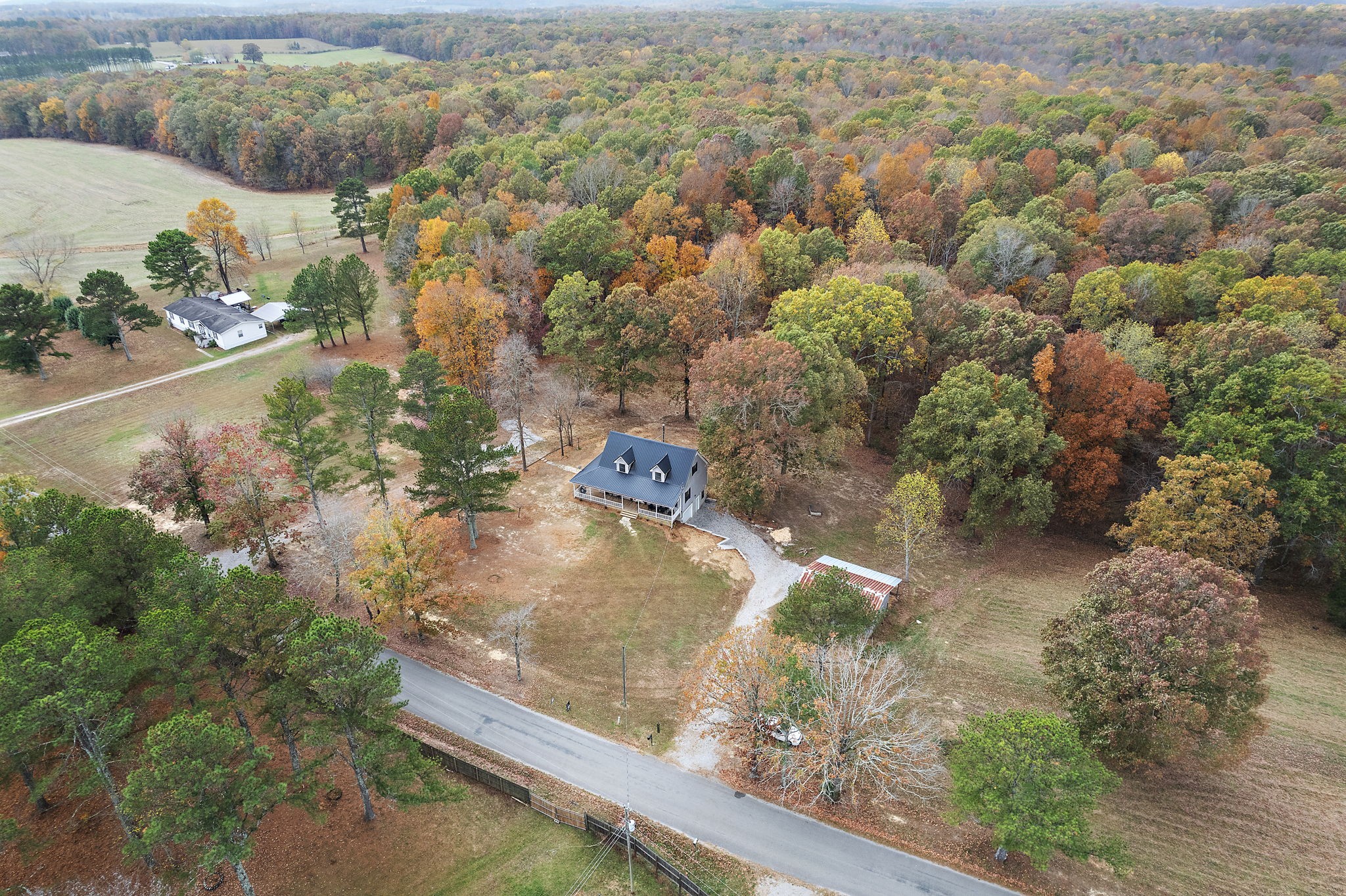 131 Locker Road Summertown, TN 38483 - Photo 34 of 38 an aerial view of a house with a yard