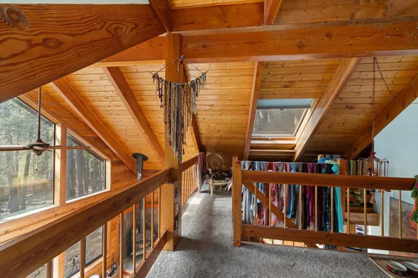 a view of balcony with furniture