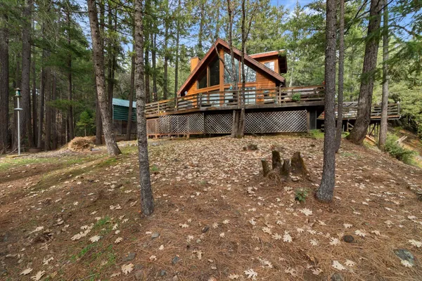 a view of backyard with deck