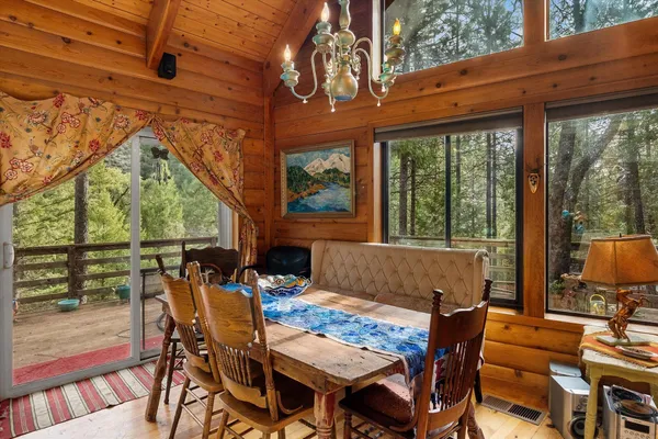 a kitchen with stainless steel appliances kitchen island granite countertop a sink and cabinets