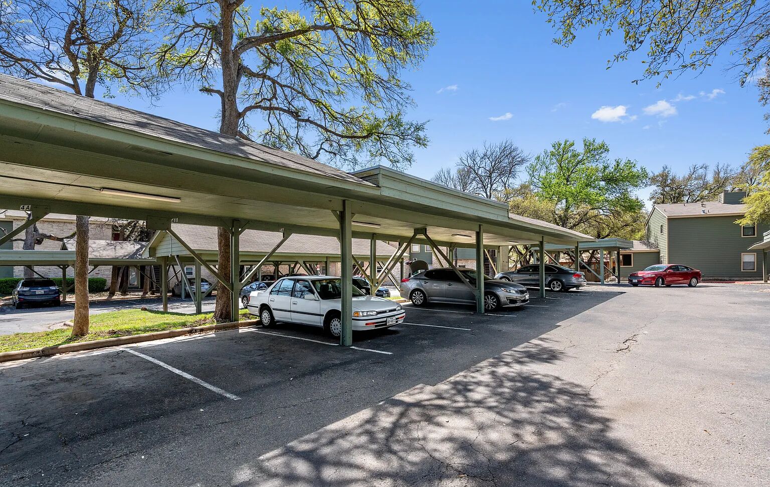 11970 Jollyville Road, Unit 202 Austin, TX 78759 - Photo 24 of 25 Covered parking offers residents protection from elements in this apartment community.