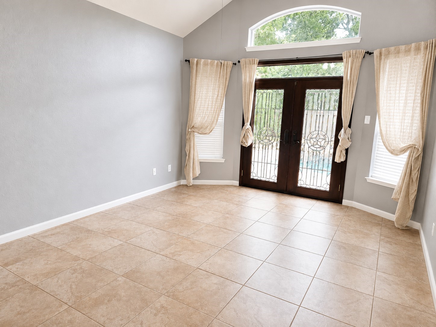20203 Timberstone Lane Spring, TX 77379 - Photo 11 of 23 The primary suite is spacious and privately located on the first floor, offering comfort and easy access. There’s plenty of room for large furniture while still feeling open.
