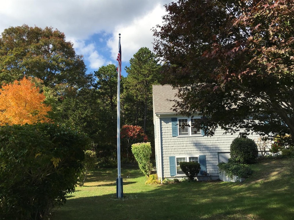 69 Stub Toe Road Barnstable, MA 02635 - Photo 3 of 27 a view of a park with a tree