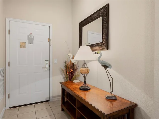 a view of a bathroom with a sink and mirror