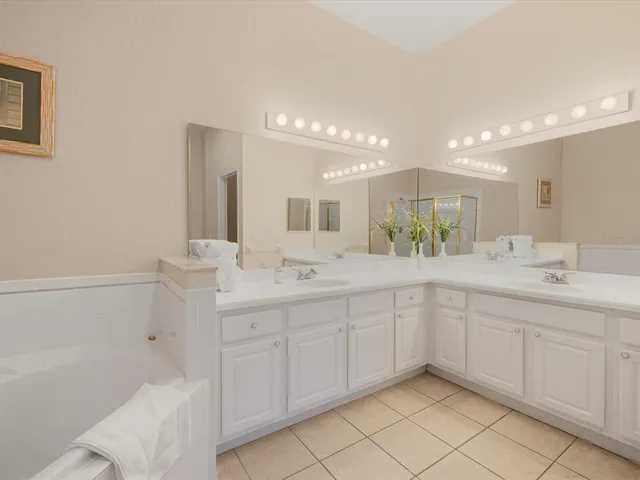 a bathroom with a sink a toilet and bathtub