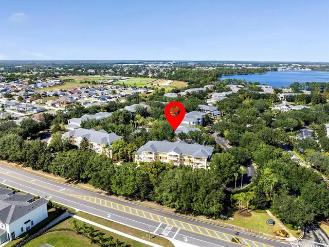 a view of a dining room with furniture and window