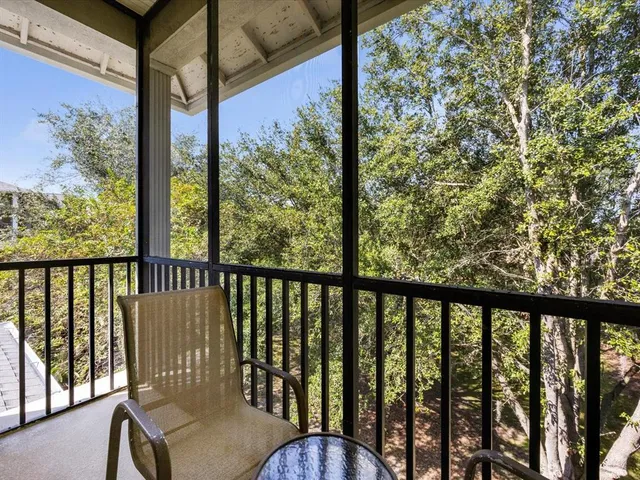 an aerial view of a house with yard swimming pool and outdoor seating