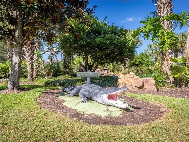 a view of a building with a yard