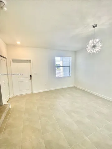 en empty room with windows