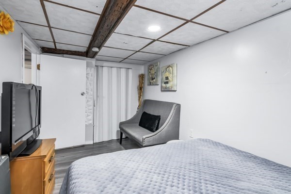 11 Cambridge Street Lawrence, MA 01843 - Photo 40 of 40 a bedroom with a bed and a television