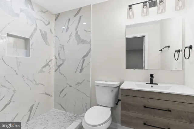 a view of house with backyard of house