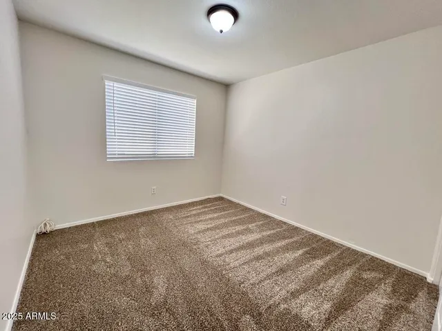 a view of a room with a window