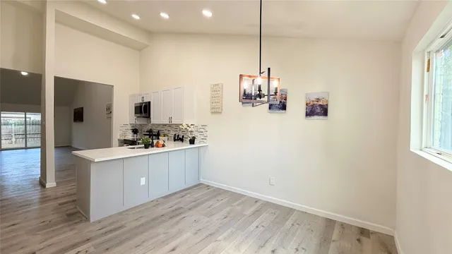 a view of livingroom with hardwood floor and window