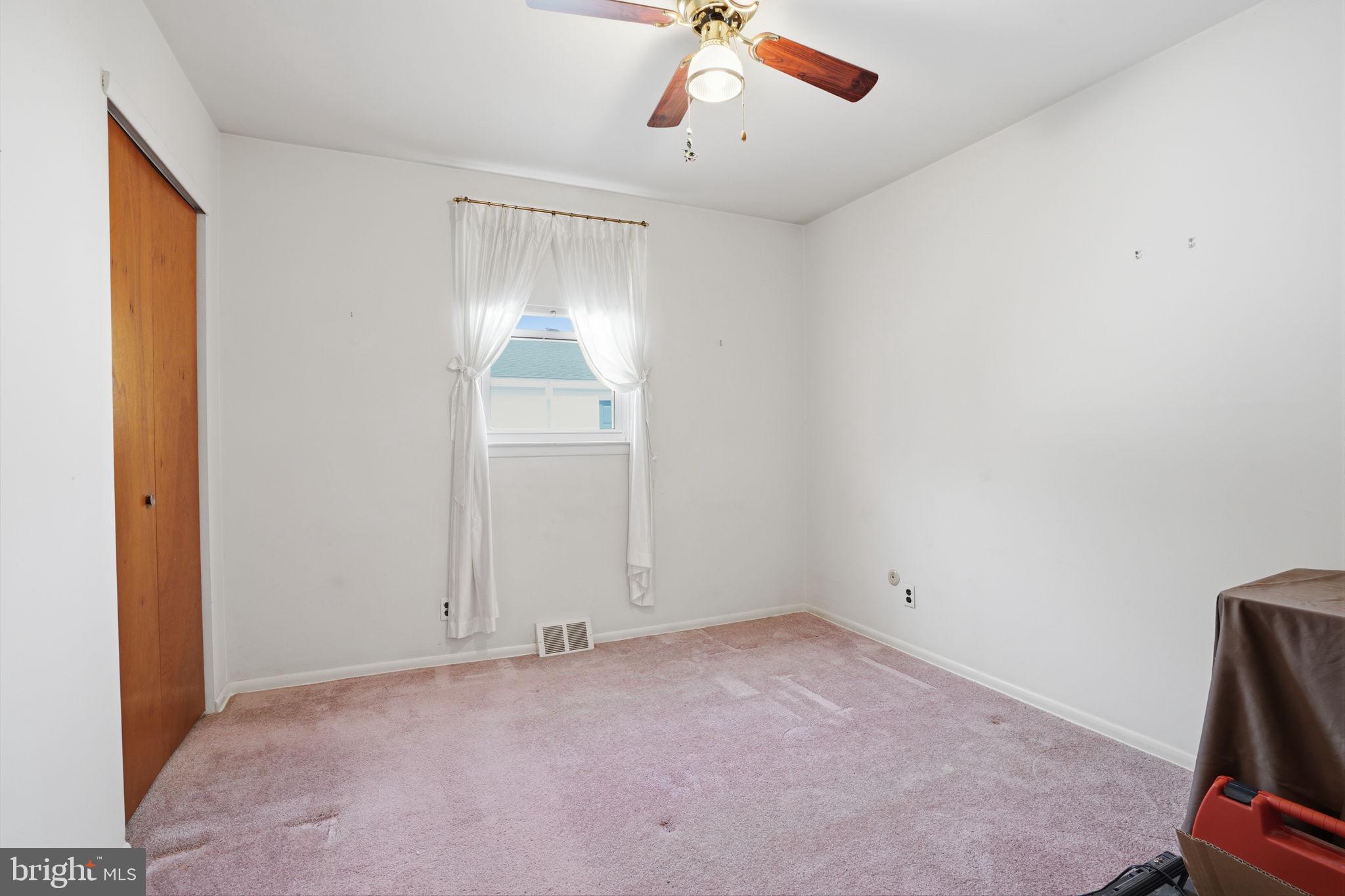 3622 Chesterfield Road Philadelphia, PA 19114 - Photo 12 of 23 an empty room with windows and fan
