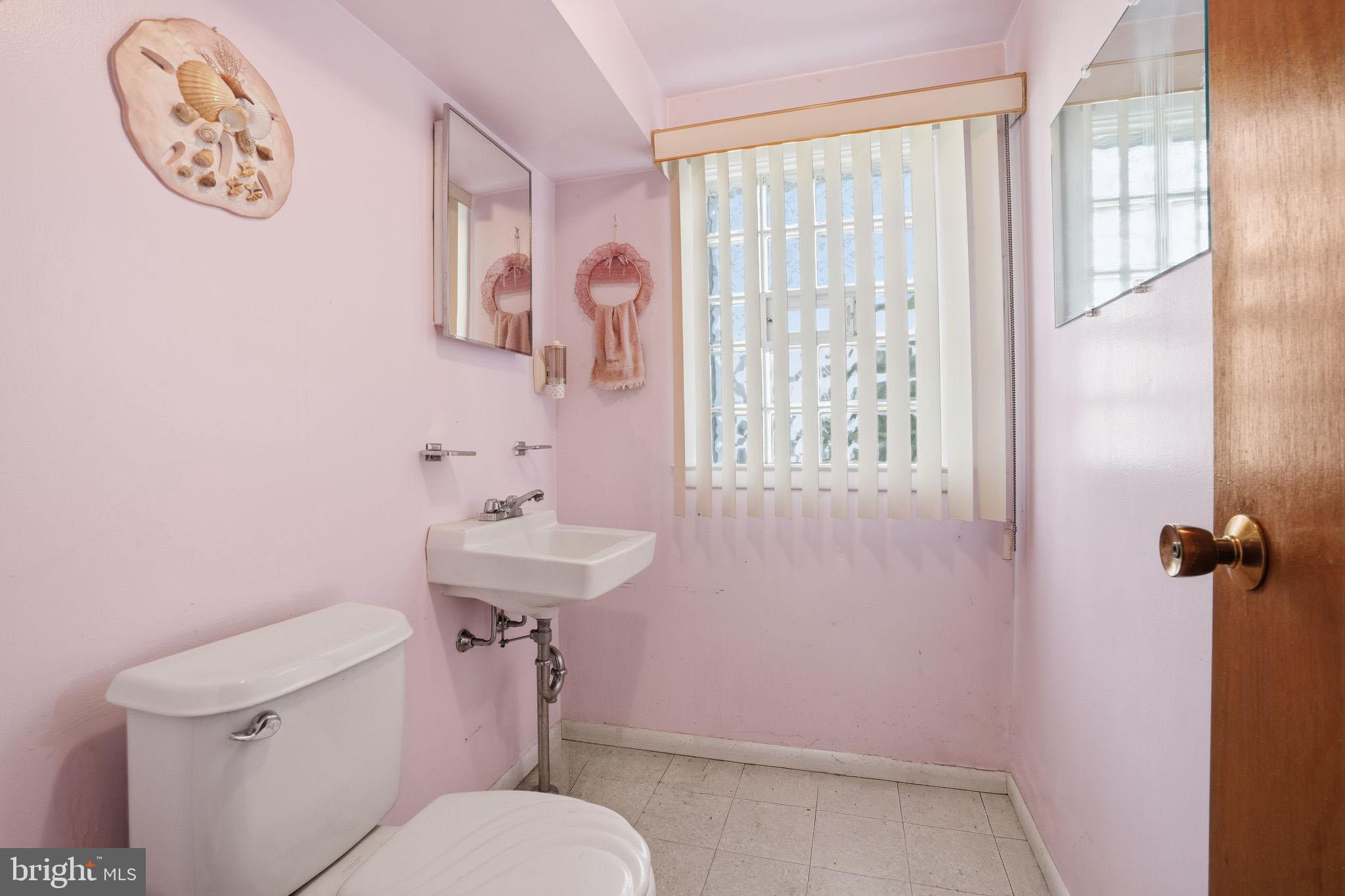 3622 Chesterfield Road Philadelphia, PA 19114 - Photo 15 of 23 a bathroom with a sink and a toilet