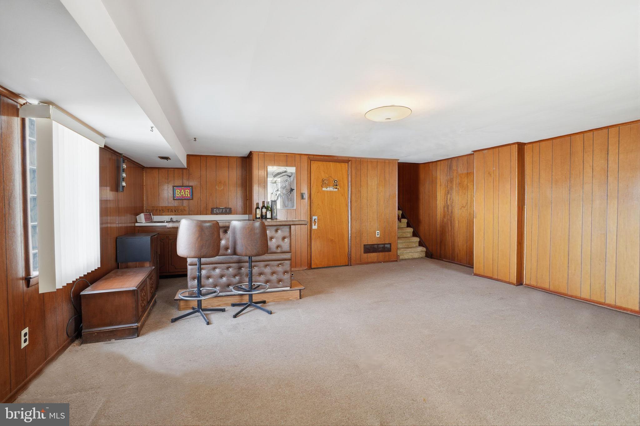 3622 Chesterfield Road Philadelphia, PA 19114 - Photo 17 of 23 a living room with furniture and a large window