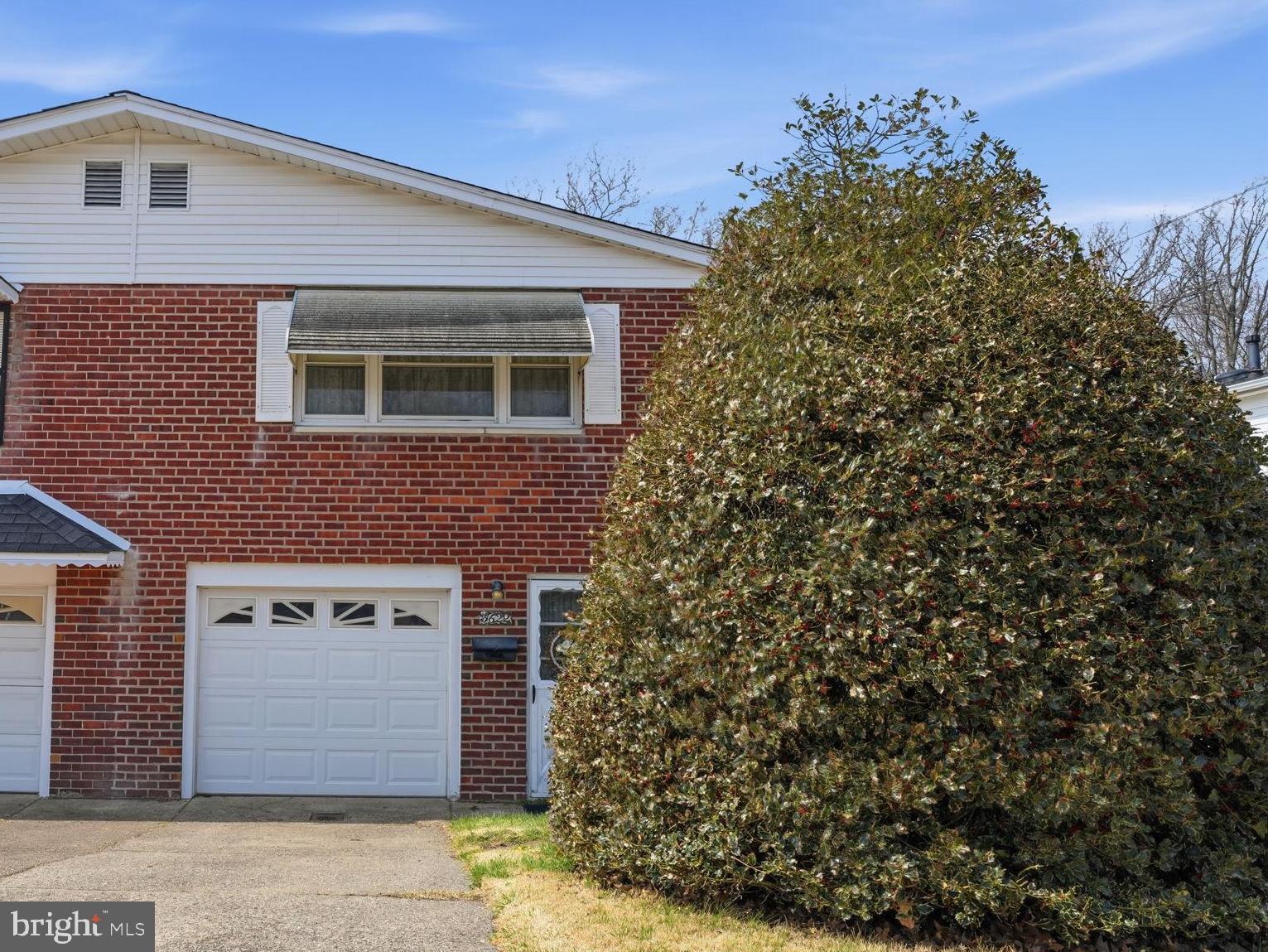 3622 Chesterfield Road Philadelphia, PA 19114 - Photo 2 of 23 a front view of a house with a garden