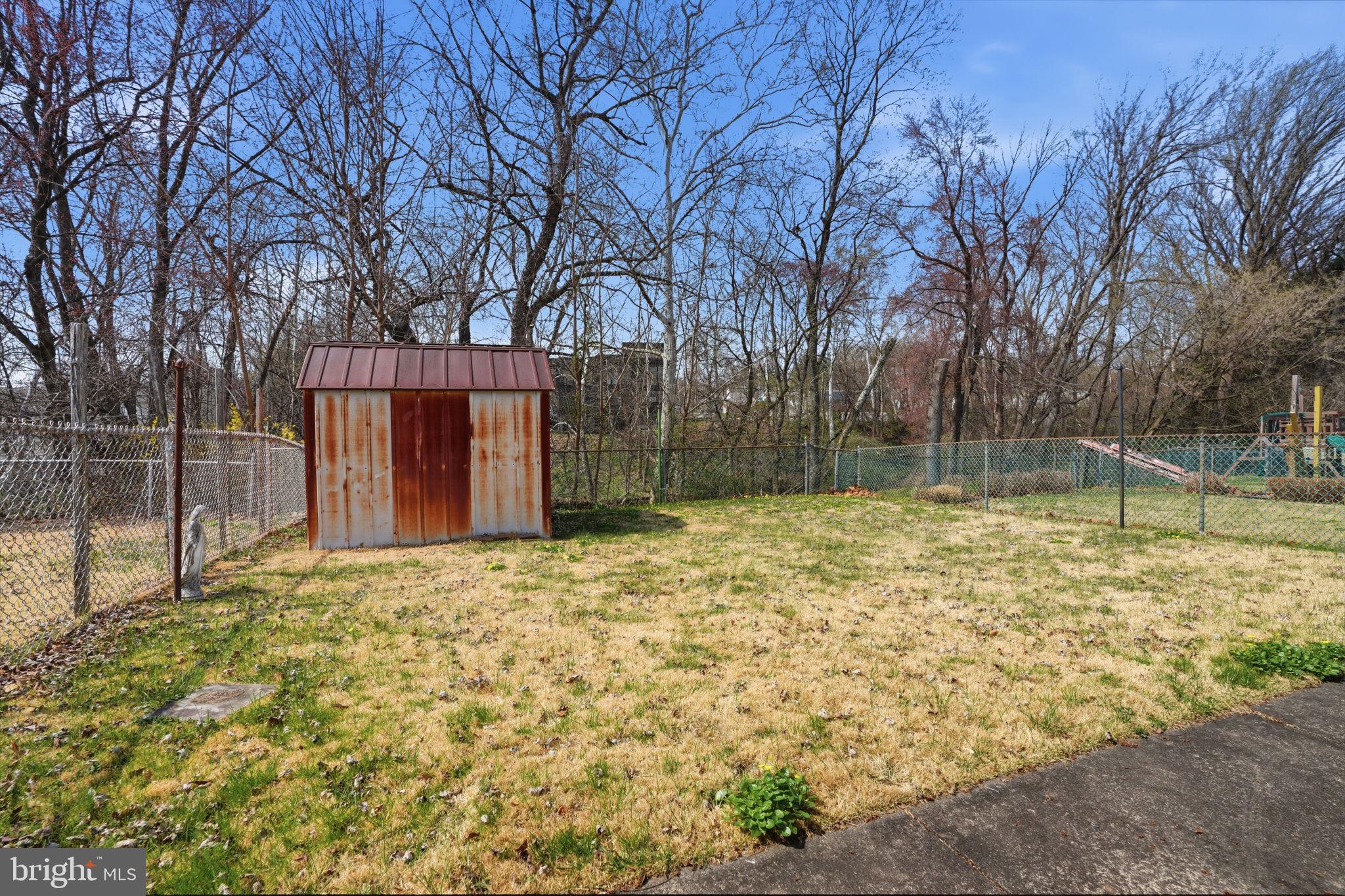 3622 Chesterfield Road Philadelphia, PA 19114 - Photo 21 of 23 a backyard of a house with a trees