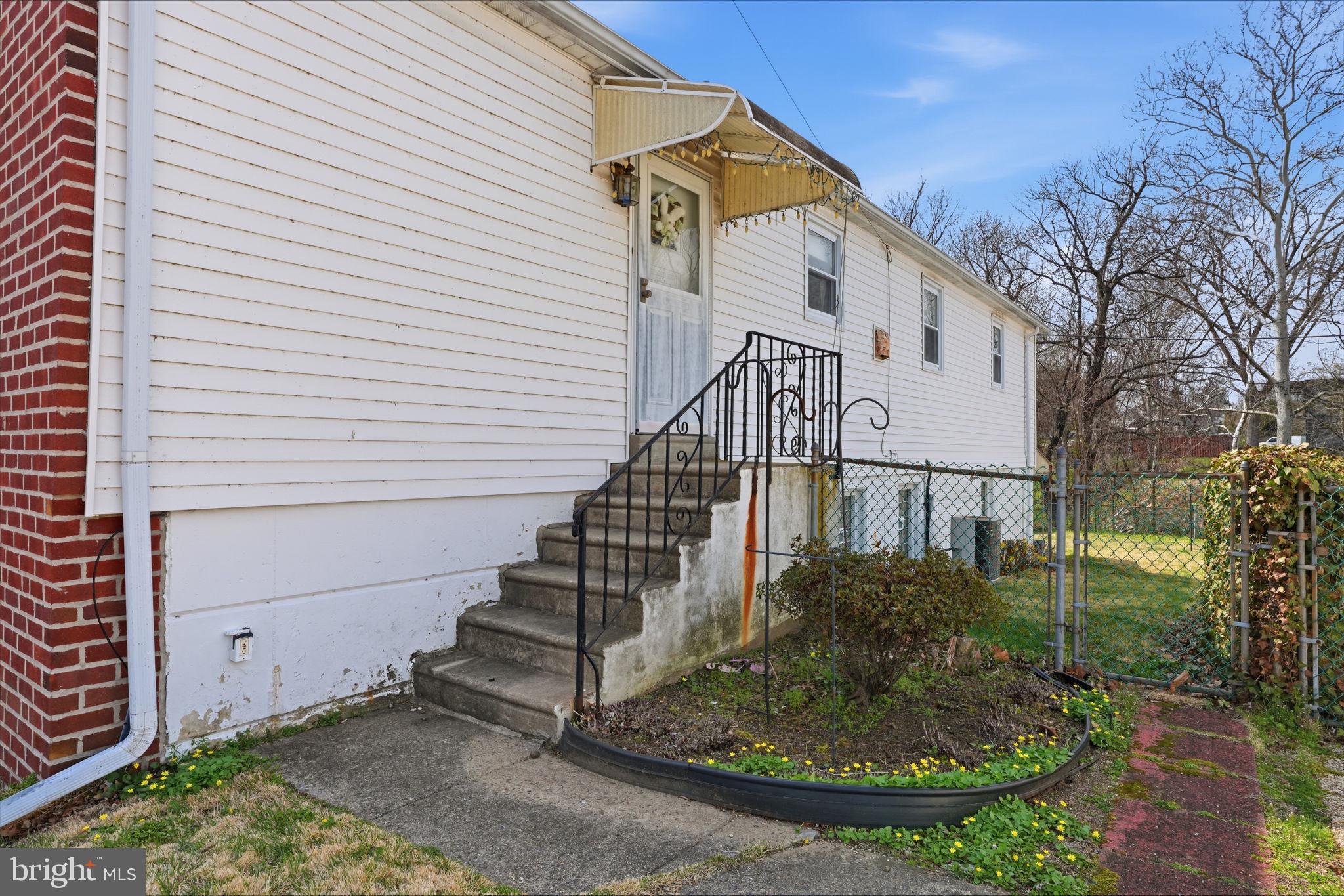 3622 Chesterfield Road Philadelphia, PA 19114 - Photo 23 of 23 a view of a house with a small yard and plants