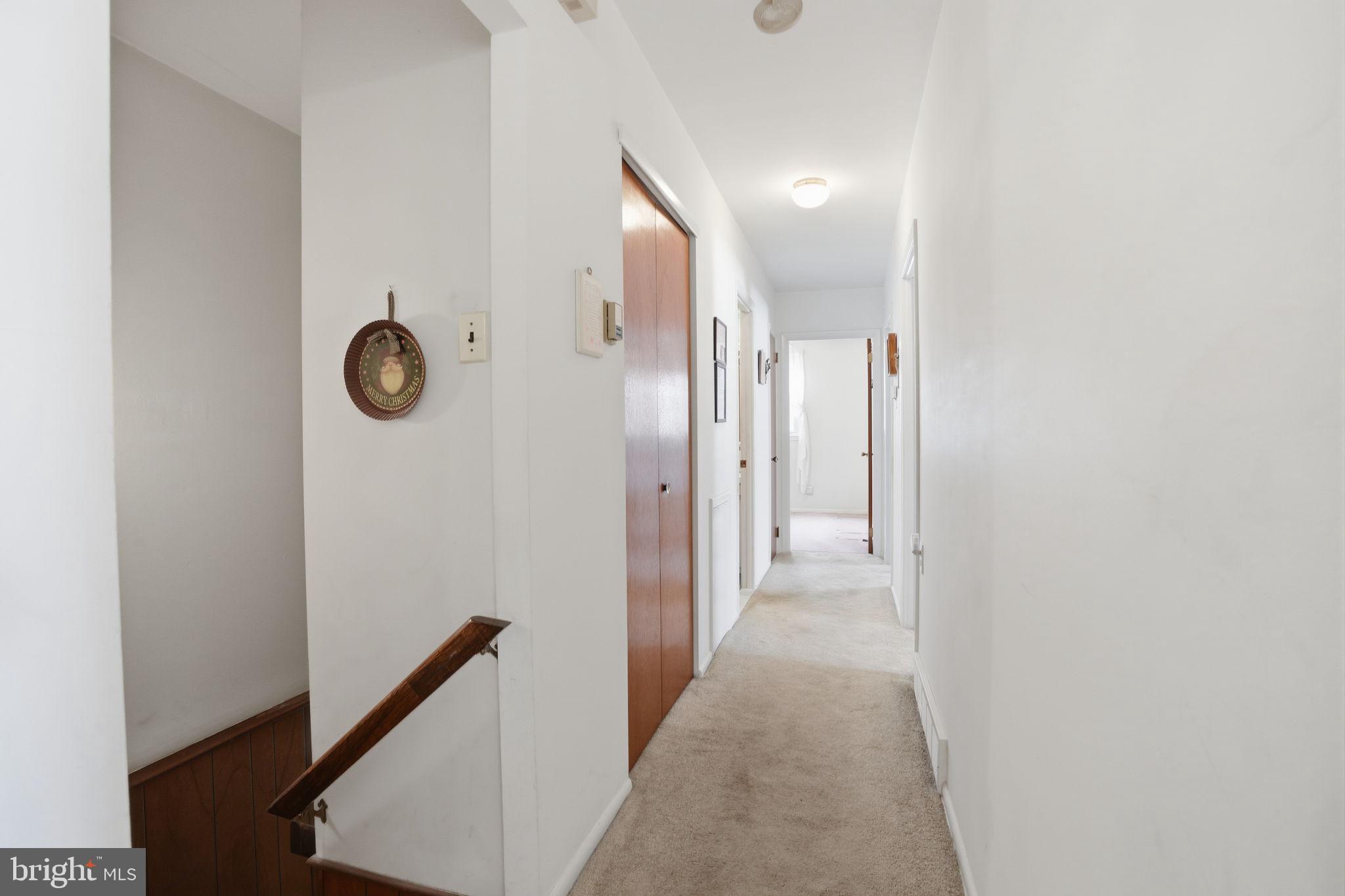 3622 Chesterfield Road Philadelphia, PA 19114 - Photo 9 of 23 a view of a hallway with wooden floor
