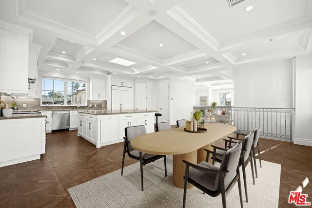 a view of a balcony with outdoor seating