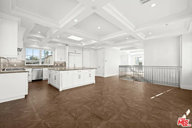 a bedroom with furniture and wooden floor