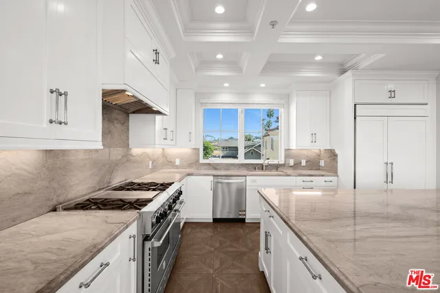 a bedroom with a bed furniture and window