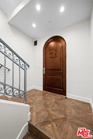 a view of a brick house with a large window
