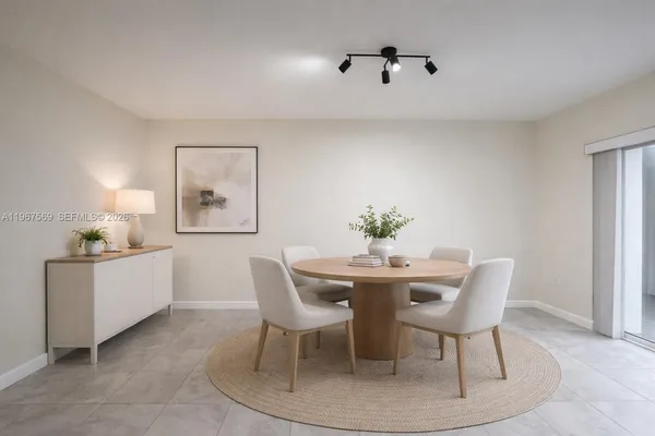 a view of a dining room with furniture