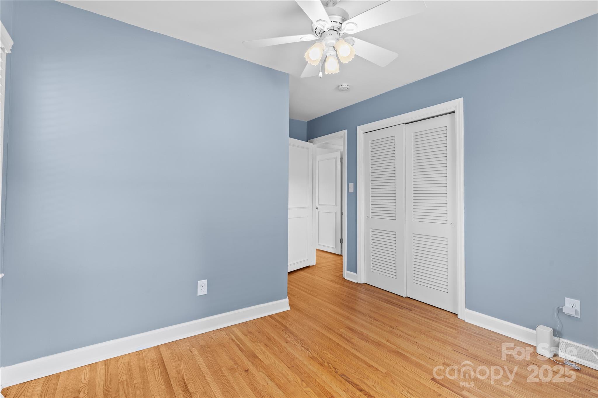 1024 Regency Drive Charlotte, NC 28211 - Photo 26 of 47 a view of an empty room with wooden floor