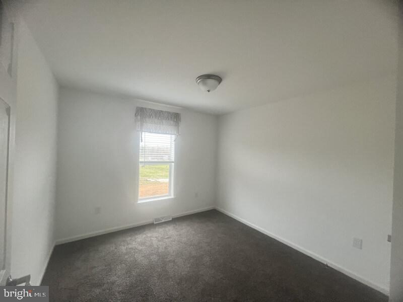 71 Ash Road Hamburg, PA 19526 - Photo 12 of 21 a view of an empty room and a window