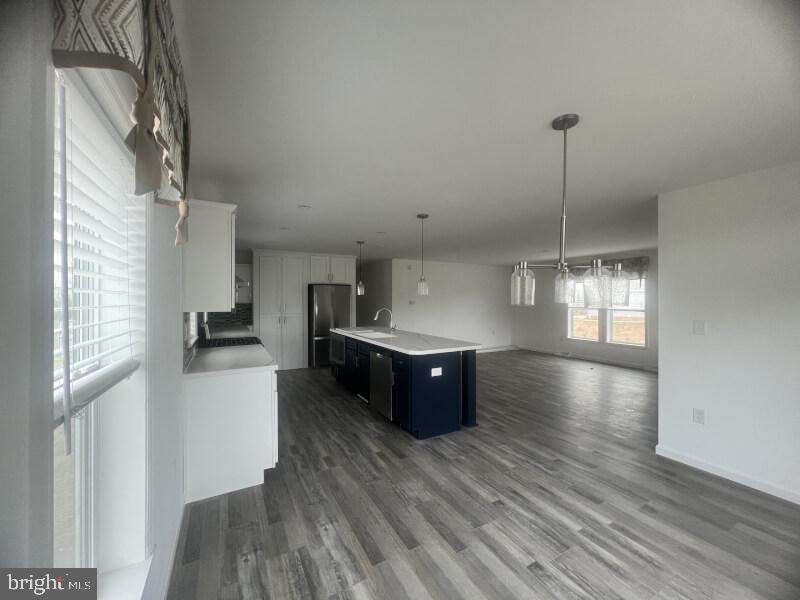 71 Ash Road Hamburg, PA 19526 - Photo 13 of 21 a kitchen with stainless steel appliances granite countertop a refrigerator a sink dishwasher a stove and a wooden floors
