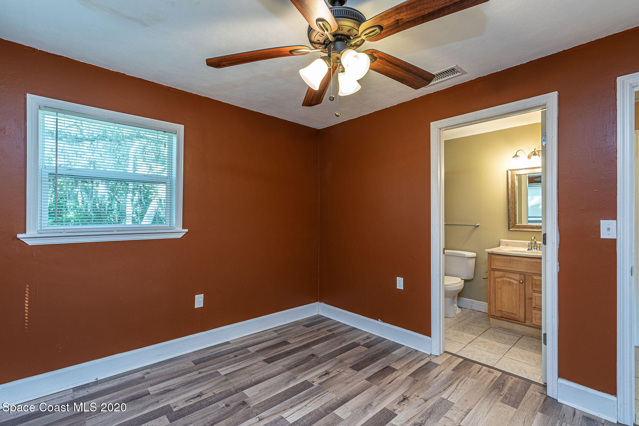 424 Rock Pit Road Titusville, FL 32796 - Photo 8 of 19 Primary Bedroom