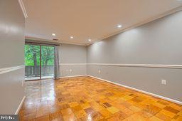 111 D Cross Keys Road, Unit 111D Baltimore, MD 21210 - Photo 25 of 35 Living room to dining room and balcony