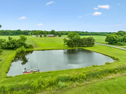a view of a lake with a big yard