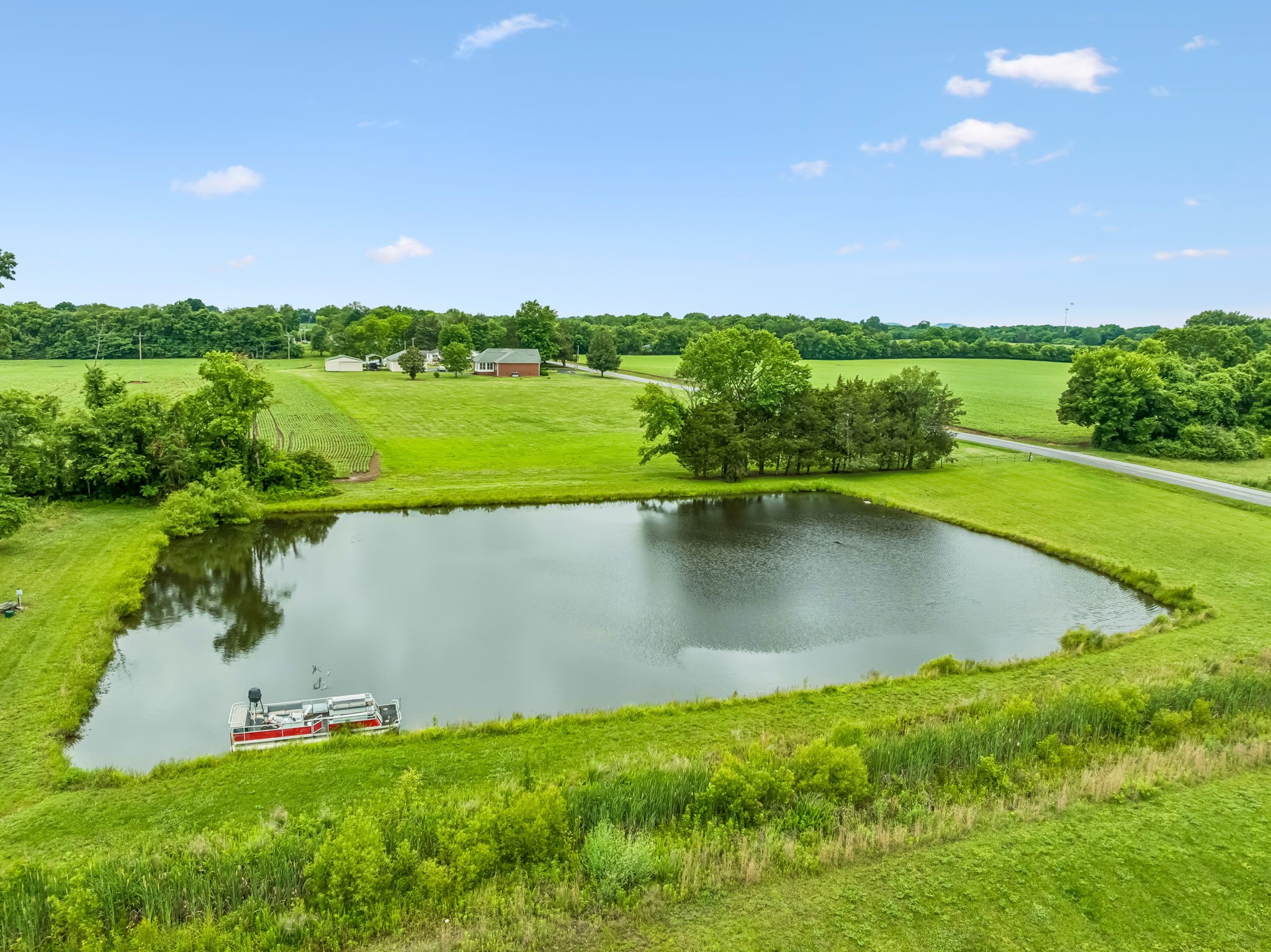 280 Kingdom Road Unionville, TN 37180 - Photo 19 of 65 a view of a lake with a big yard