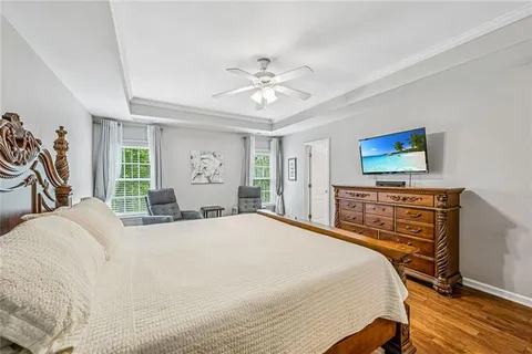 a room with pool table and a window