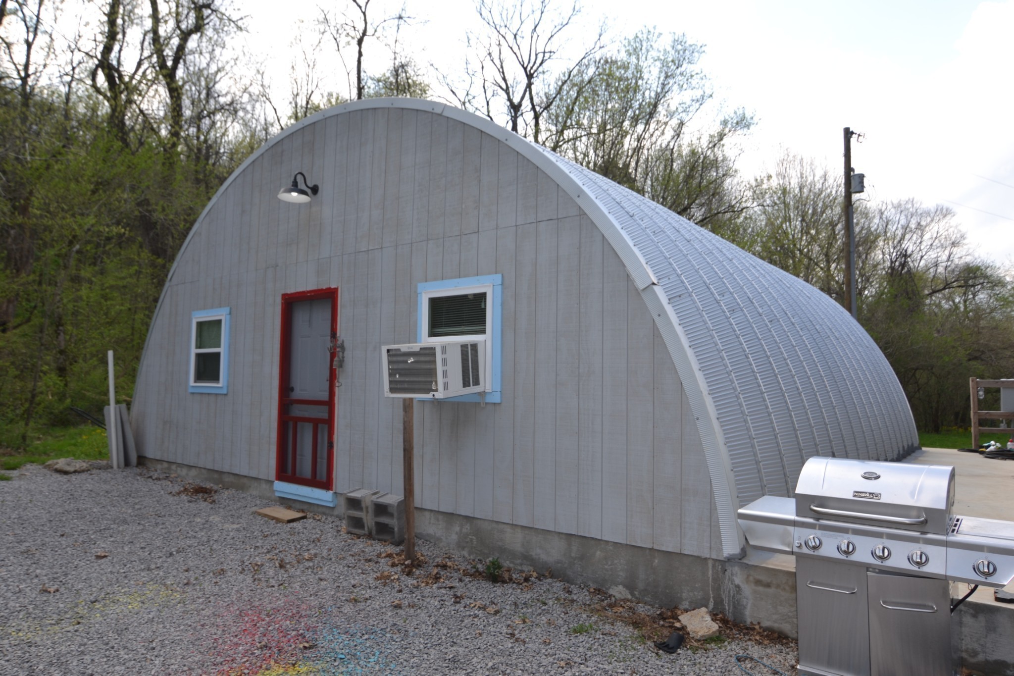 a backyard of a house with a yard and garage