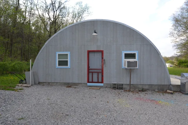 a front view of a house with yard