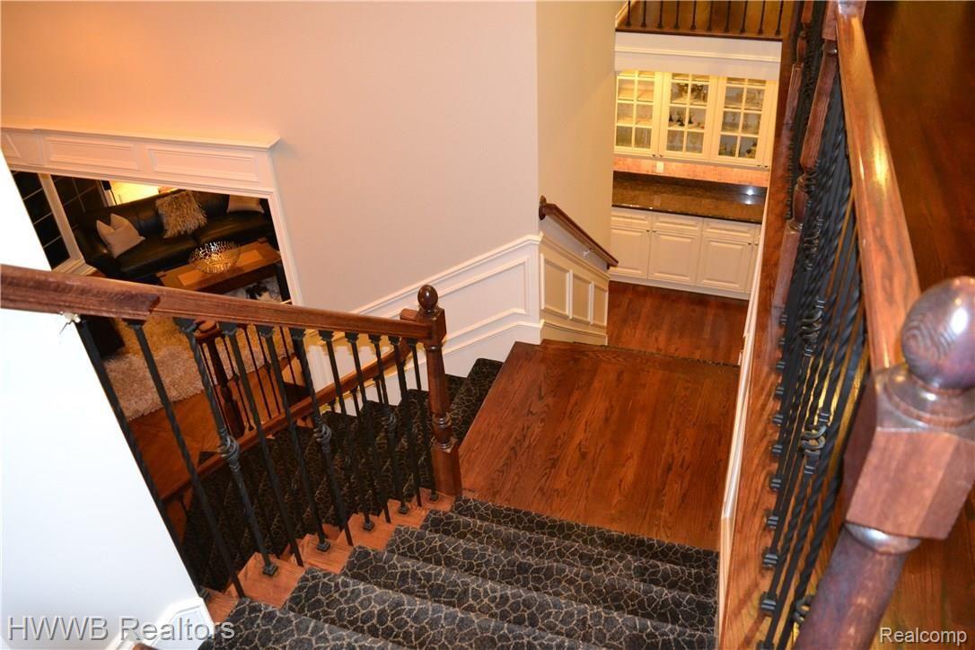 5590 Leeds Court Rochester, MI 48306 - Photo 71 of 73 Split Staircase to foyer and butler's pantry