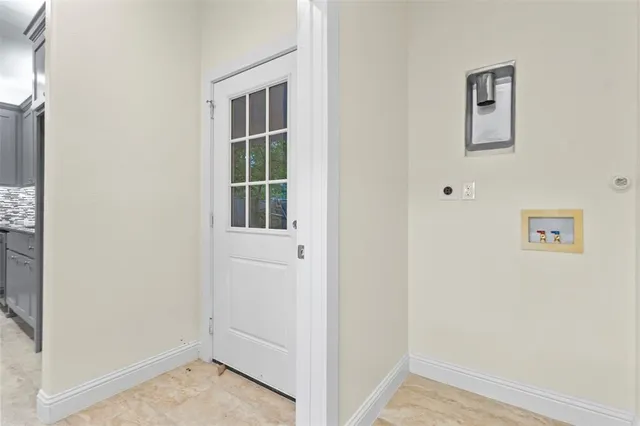 a kitchen with a refrigerator stove and sink