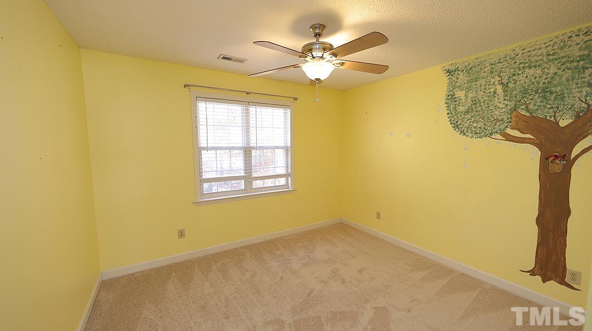 3545 Dewing Drive Raleigh, NC 27616 - Photo 11 of 13 a view of a room with a window and ceiling fan