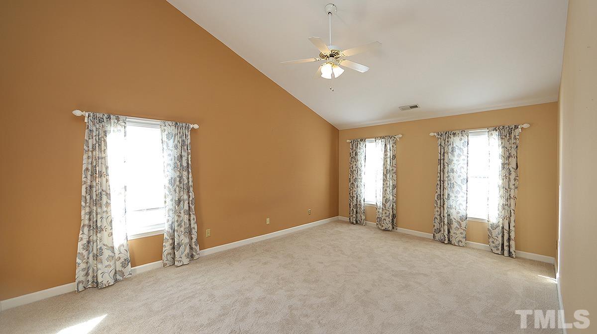 3545 Dewing Drive Raleigh, NC 27616 - Photo 8 of 13 a view of an empty room with a window
