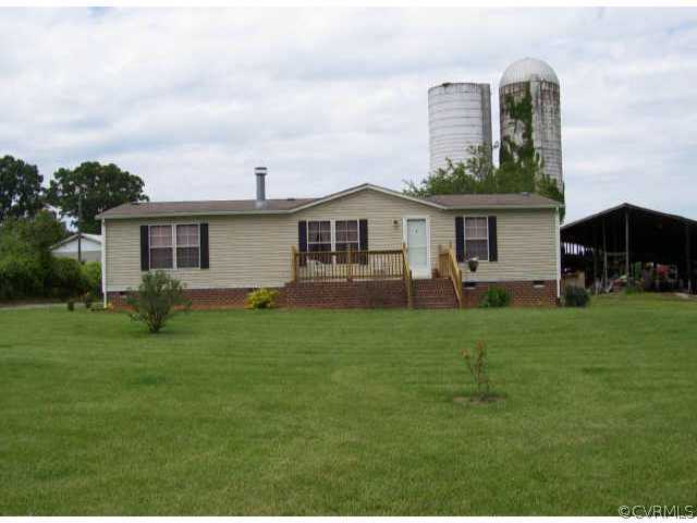 83 Boston Hill Road Cartersville, VA 23027 - Photo 1 of 5 Exterior Front - Front view showing 2 silos in bac