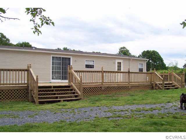 83 Boston Hill Road Cartersville, VA 23027 - Photo 2 of 5 Other - Rear of house with full length deck