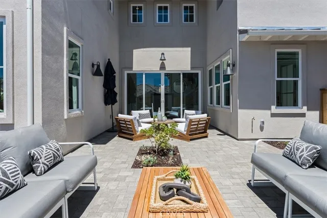 a living room with furniture and window