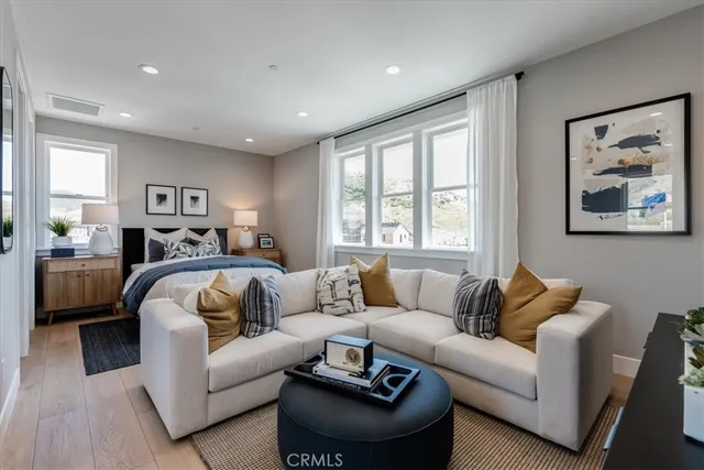 a living room with furniture or couch and a window