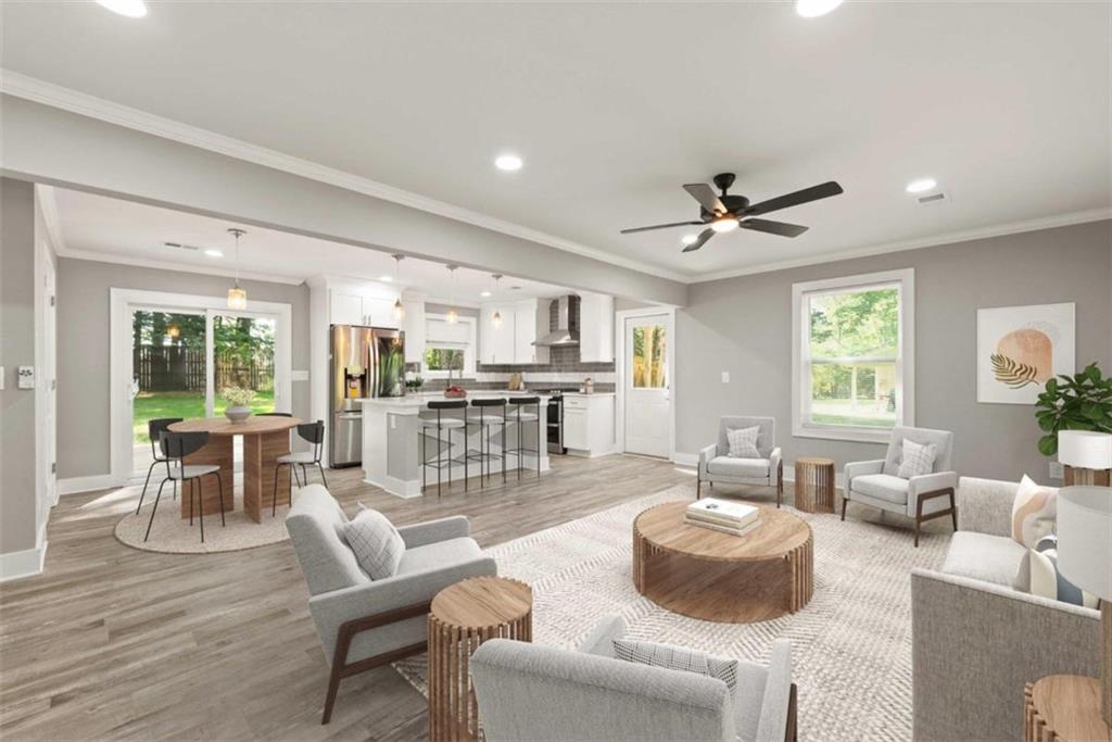 1875 Harmony Road Powder Springs, GA 30127 - Photo 1 of 1 a living room with furniture and a large window