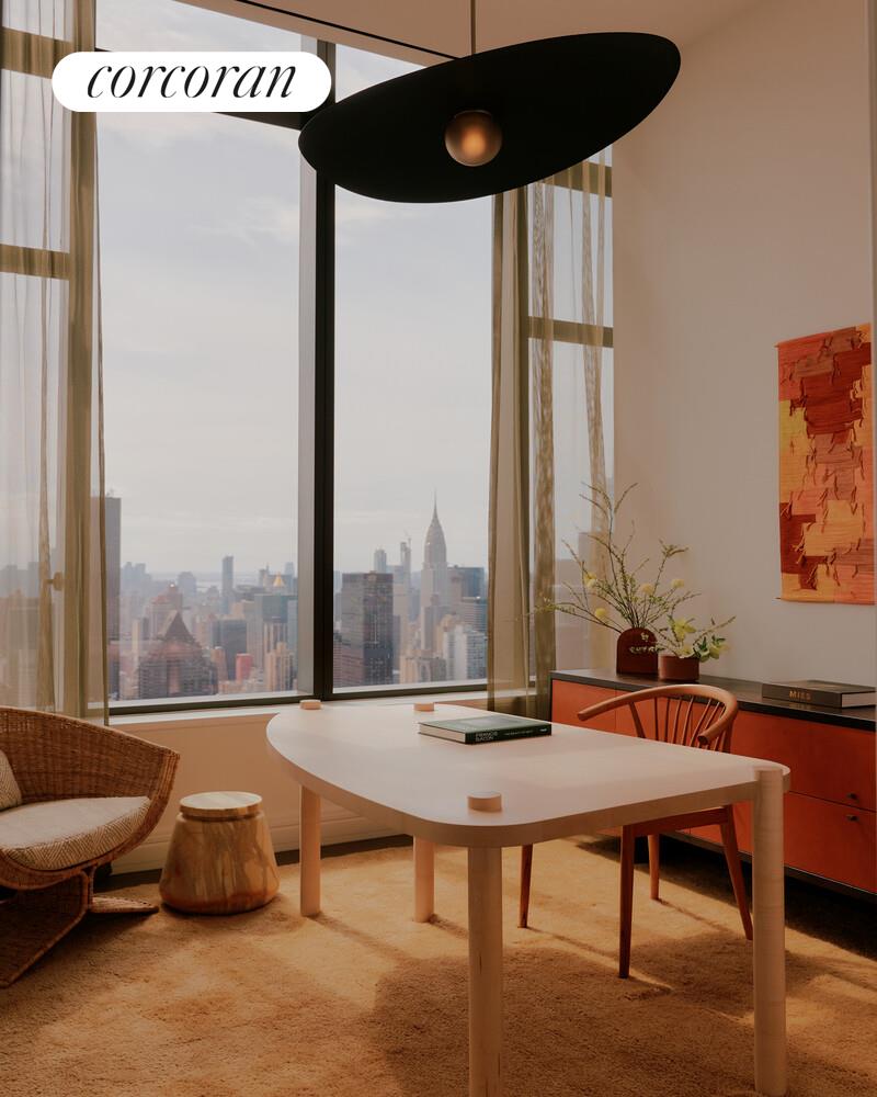 430 East 58th Street, Unit 70 Manhattan, NY 10022 - Photo 3 of 24 a living room with furniture