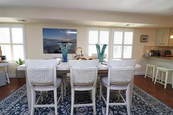 a view of a dining room with furniture